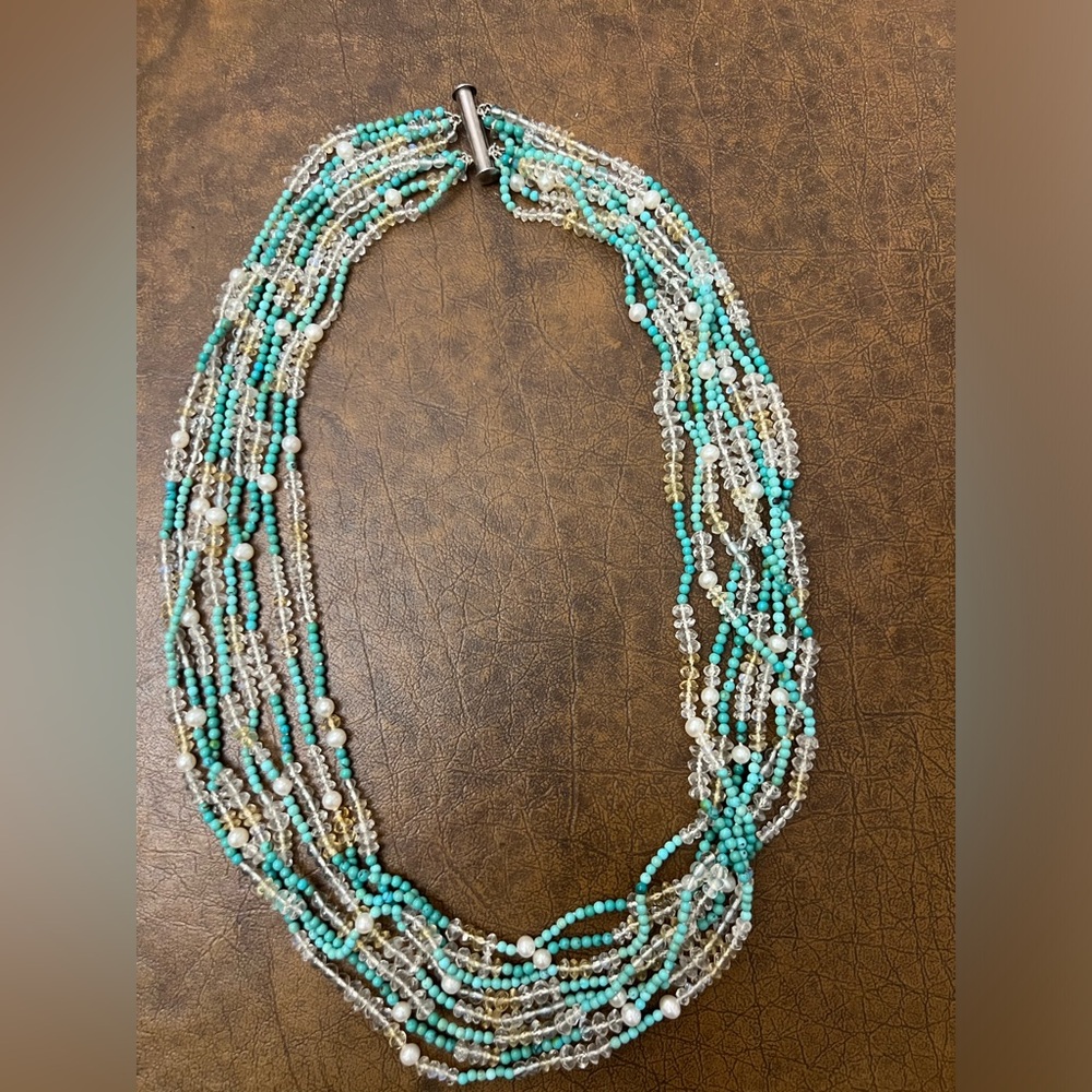 Sterling silver clasp with turquoise, crystal, & pearl beads. 8” diameter